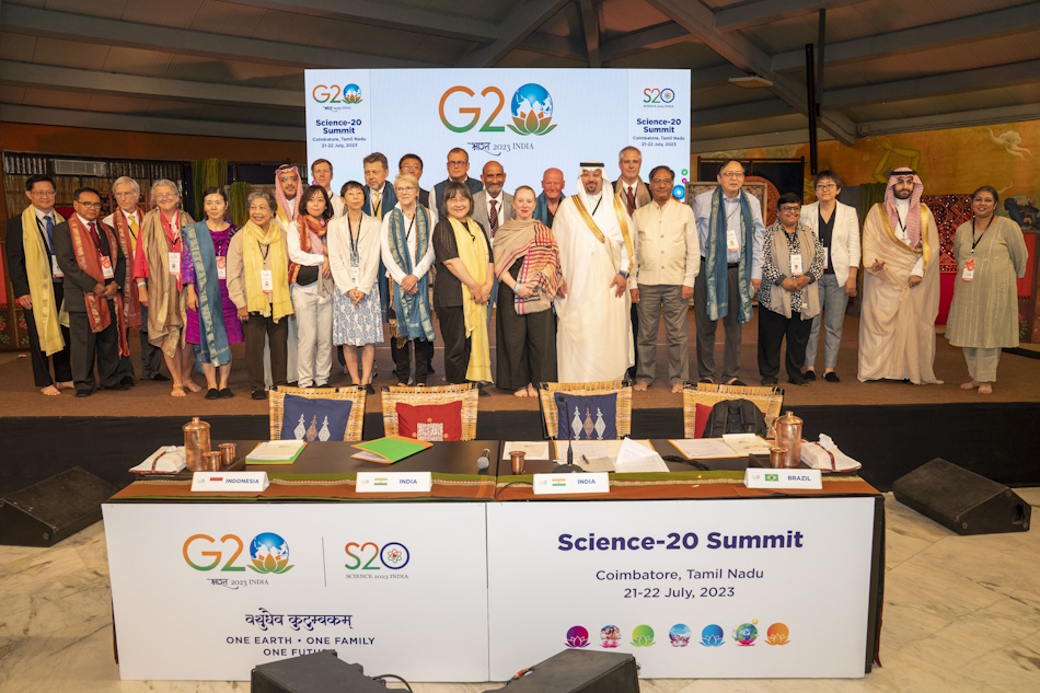 People standing on a stage at the Science 20 Summit in Coimbatore, Tamil Nadu