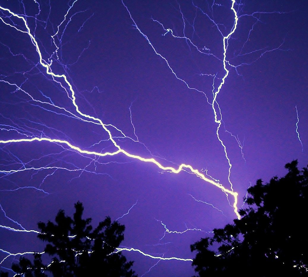 Lightning is an electrostatic discharge that travels between two charged regions