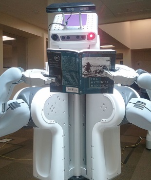PR2 robot reading.