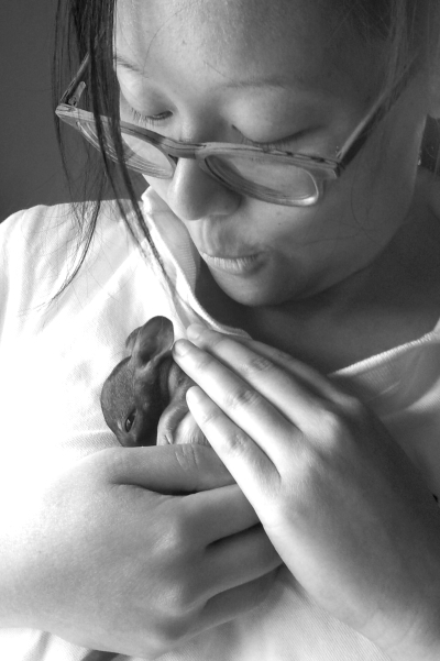Stephanie Hing with a critically endangered woylie or brushtailed bettong