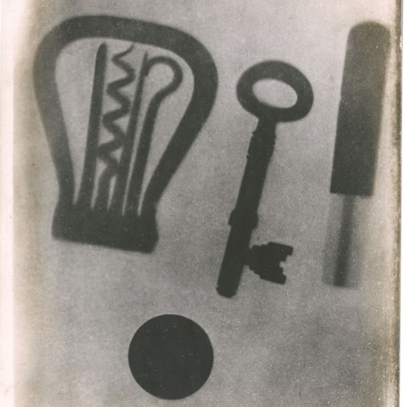 X-ray photograph of objects in a calico pocket, including a folding corkscrew, key and coin, by A A Campbell Swinton, 1896.