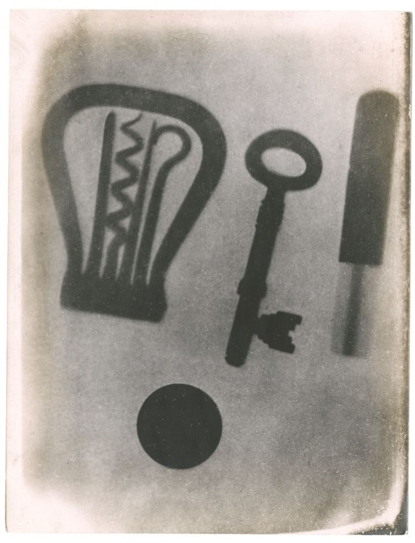 X-ray photograph of objects in a calico pocket, including a folding corkscrew, key and coin, by A A Campbell Swinton, 1896.
