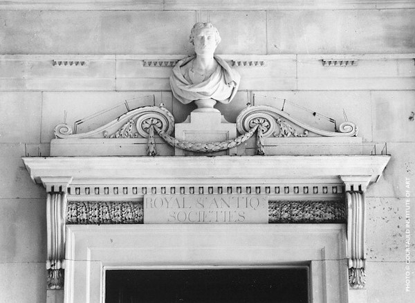 A bust of Sir Isaac Newton above the entrance to the Fine Rooms at Somerset House, London