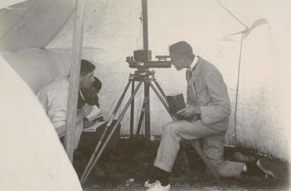 Bernacchi (?) taking magnetic observations with a Unifilar Magnetometer