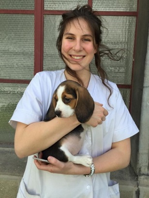 Mathilde Massenet, holding a 9-week-old Beagle puppy. Photo credit: Karine Reynaud