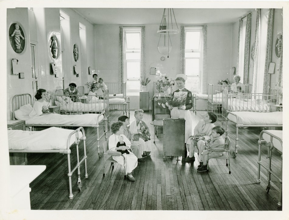 An old photograph showing a children's hospital ward at Harrow Cottage Hospital