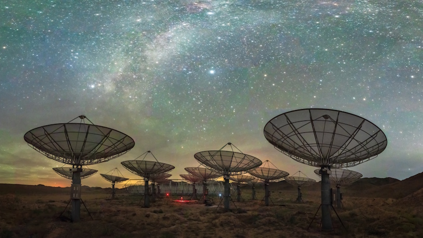 satellite-dishes-pointing-towards-starry-night-sky