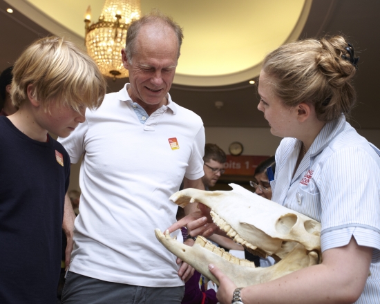 Members of the public interacting with scientists and exhibits at the Summer Science Exhibition.