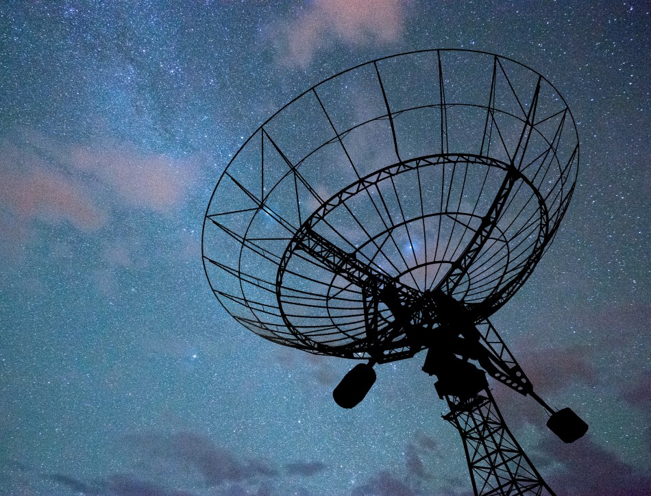 Radio telescope in the night sky