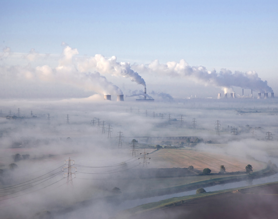 Fossil fuel power stations in the English Midlands on a winter morning.