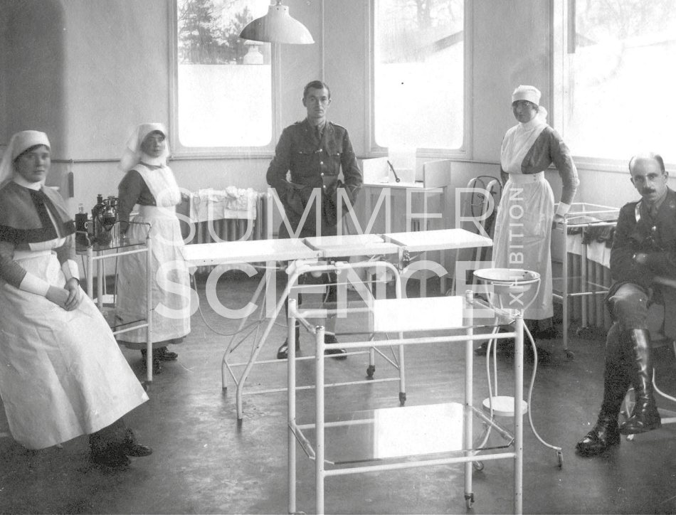 Summer Science Exhibition: a black and white photograph of doctors and nurses in an early 20th century operating theatre
