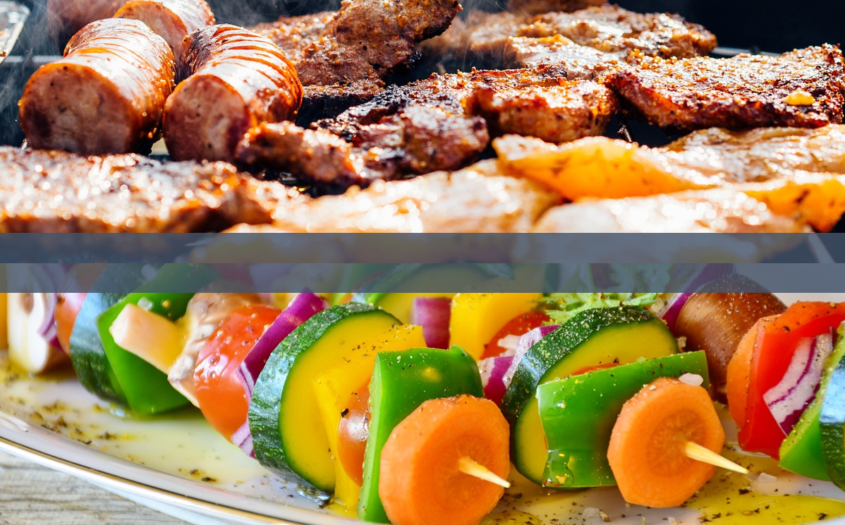 Photograph of meat on a barbeque and vegetables on skewers.